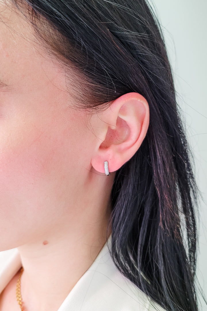 Radiant Silver Huggie Earrings