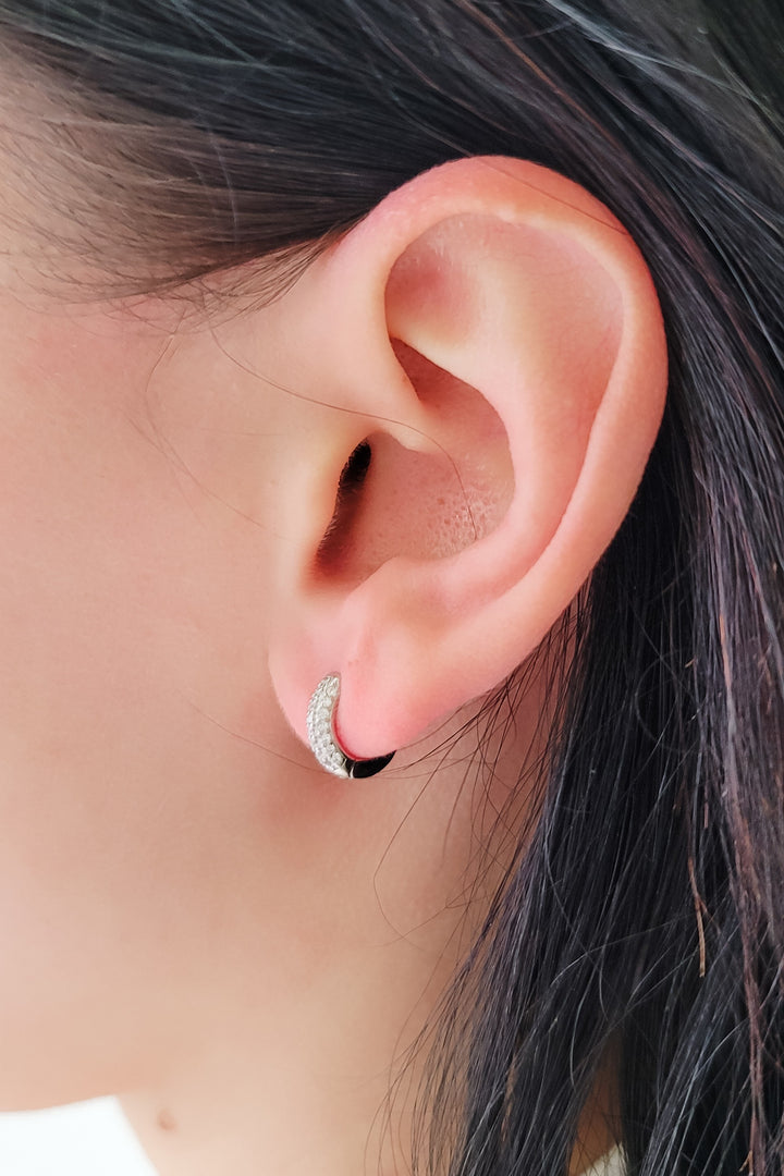 Radiant Silver Huggie Earrings